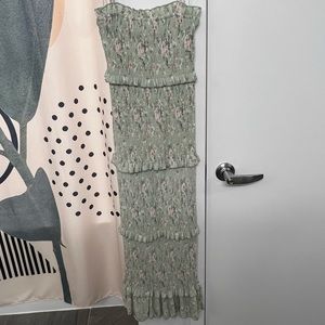 Light green spaghetti strap dress.